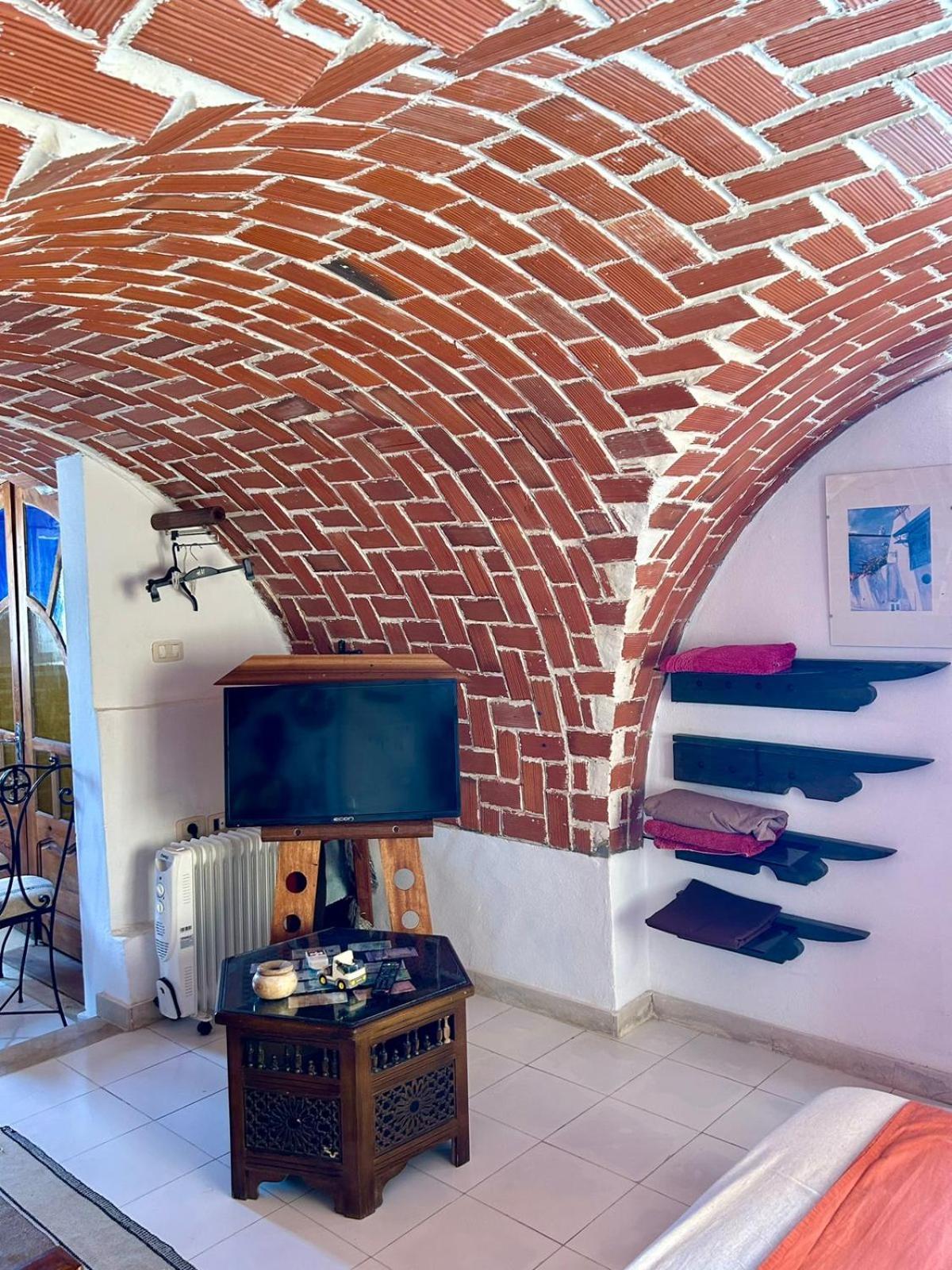 L'Artisan Hotel Harqalah Екстериор снимка