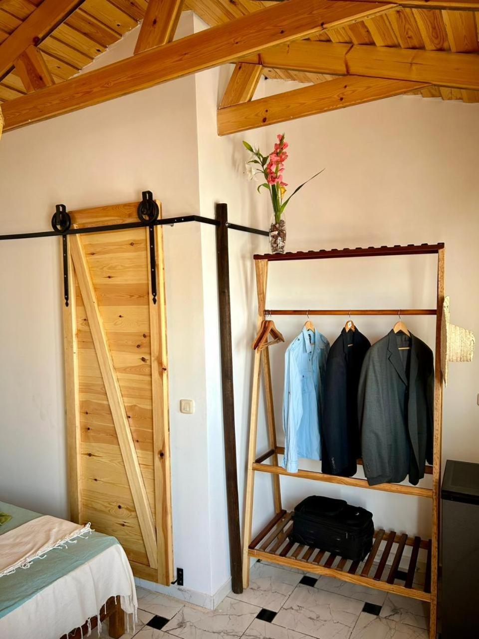 L'Artisan Hotel Harqalah Екстериор снимка