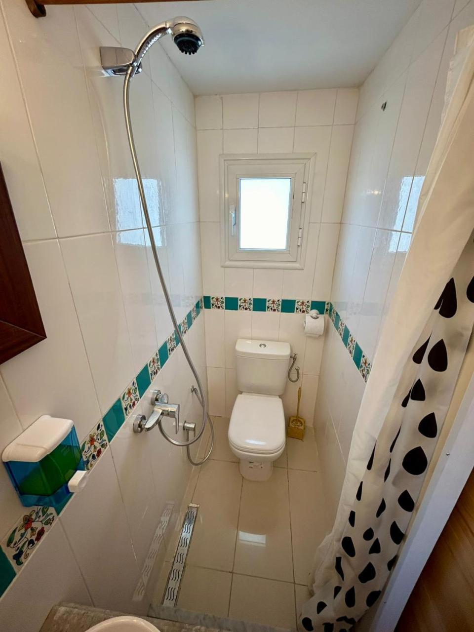 L'Artisan Hotel Harqalah Екстериор снимка