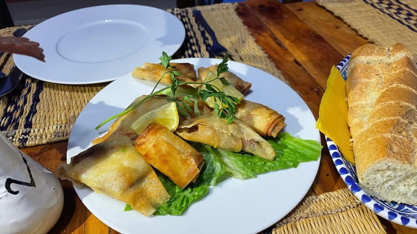 L'Artisan Hotel Harqalah Екстериор снимка