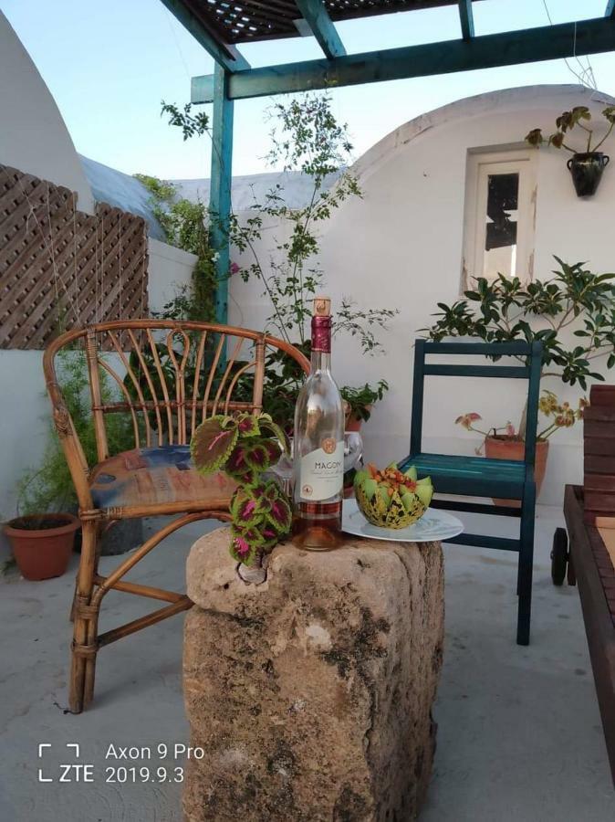 L'Artisan Hotel Harqalah Екстериор снимка